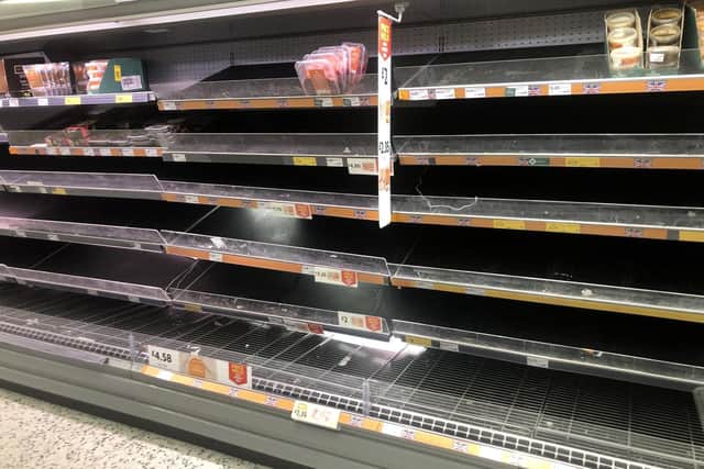 Empty shelves at a Morrisons supermarket in Whitley Bay in March 2020 as Covid-19 hit. Photo: Owen Humphreys/PA Wire