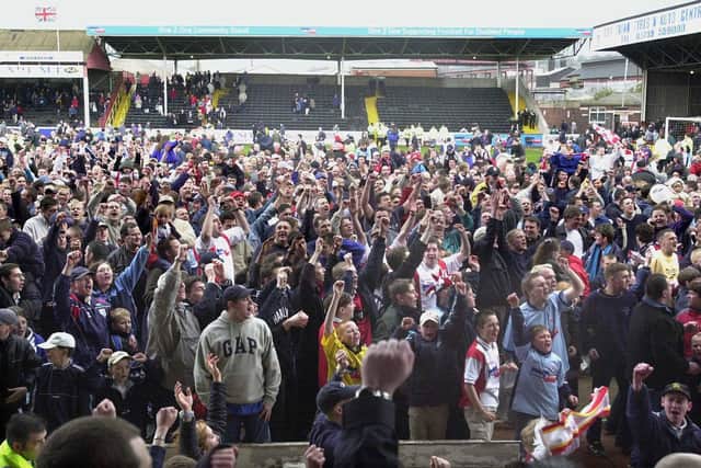 The Rotherham United fans celebrate their side's promotion back in 2001.