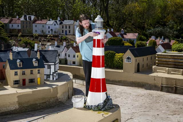 Oliver Whitehead helps out with the preparations at Bondville Model Village at Sewerby, Bridlington for their reopening for the start of the season on May 1st. . Picture Tony Johnson