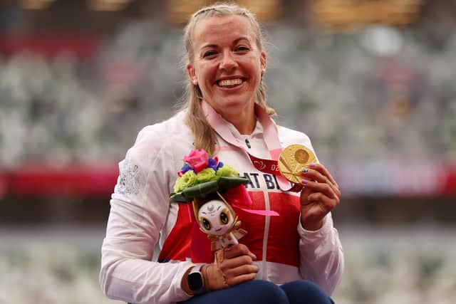 Gold medalist Hannah Cockroft celebrates during the medal ceremony for the Women's 800m - T34 Final on day 11 of the Tokyo 2020 Paralympic Games. (Photo by Naomi Baker/Getty Images)