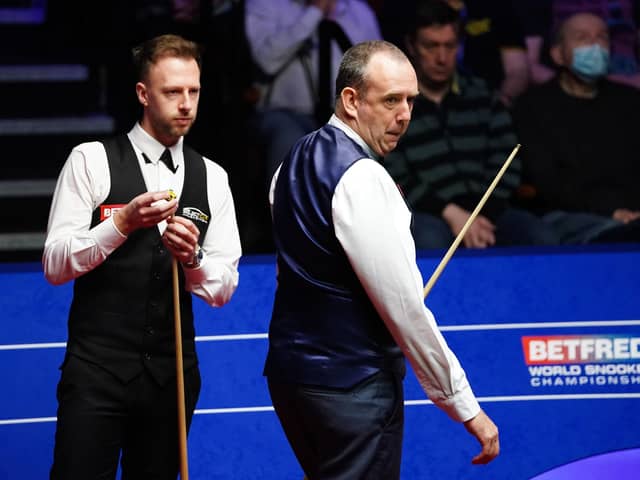 Wales' Mark Williams in action against England's Judd Trump.
