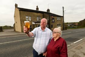 Steve and Margaret Lowe outside the Lower Royal George in Scammonden