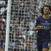 Manchester City's Nathan Ake celebrates after scoring his side's second goal during the English Premier League soccer match between Leeds United and Manchester City at Elland Road. (AP Photo/Rui Vieira)