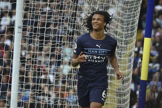 Manchester City's Nathan Ake celebrates after scoring his side's second goal during the English Premier League soccer match between Leeds United and Manchester City at Elland Road. (AP Photo/Rui Vieira)