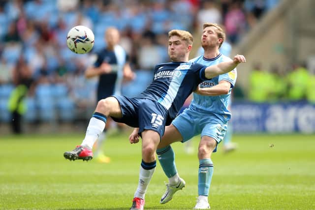 Huddersfield Town's Scott High (left) and Coventry City's Jamie Allen (Picture: PA)