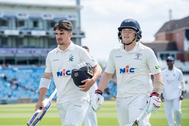Yorkshire's Dom Bess (r) leaves the field with Jordan Thompson at lunch against Kent. (Picture: Allan McKenzie/SWPix.com)
