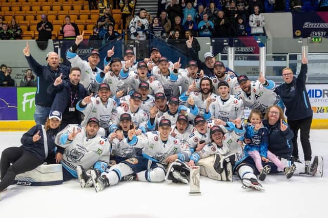 Sheffield Steeldogs' players celebrate their NIHL National play-off success at Coventry after beating Milton Keynes Lightning 4-1 in Sunday's grand final. Picture courtesy of Peter Best.