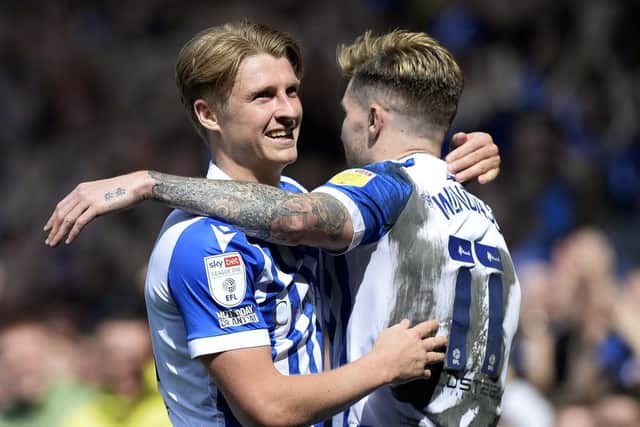 EYES ON WEMBLEY: George Byers and Josh Windass celebrate during Sheffield Wednesday's win on Saturday. Picture: Steve Ellis.