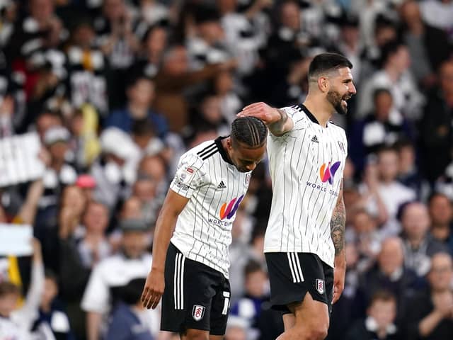RECORD BREAKER: Fulham's Aleksandar Mitrovic (right) celebrates scoring Fulham's fourth goal of the game with team-mate Bobby Decordova-Reid. Picture: John Walton/PA Wire.