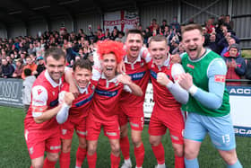 GOING UP: Scarborough players celebrate their promotion to National League North after a play-off victory over Warrington Town. Picture: Richard Ponter