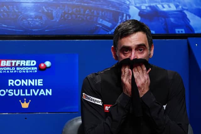Tears of joy: Ronnie O'Sullivan reacts after winning the Betfred World Snooker Championship against Judd Trump at The Crucible, Sheffield. Picture: Zac Goodwin/PA Wire.