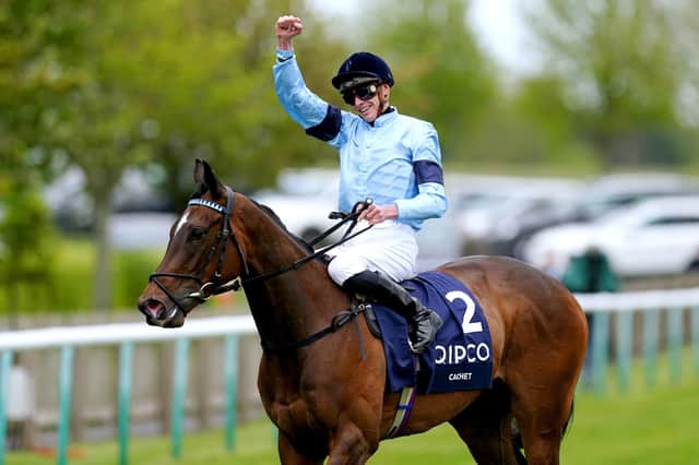 Fine achievement: Jockey James Doyle celebrates on Cachet after winning the Qipco 1000 Guineas Stakes, yesterday - following up Saturday's 2000 Guineas success on Coroebus. Picture: David Davies/PA Wire