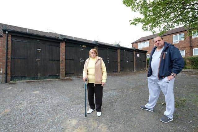 Worried residents are calling for action to deal with fears of a rat infestation around garages on Firshill Crescent in Shirecliffe. Pictured are Maureen Scott and Barry Scott from the local TARA.