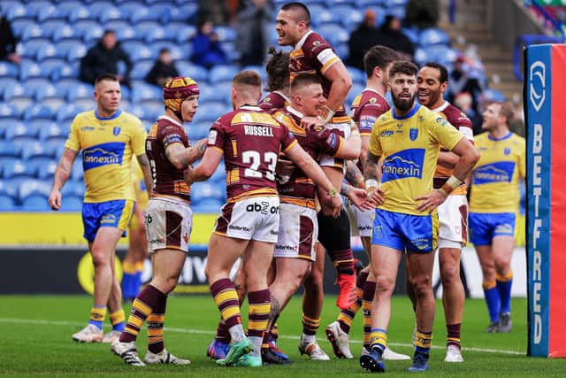 Huddersfield celebrate Luke Yates' try in the league game between the sides in February. (Picture: SWPix.com)