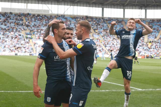 IN-FORM: Huddersfield Town players celebrate during their win over Coventry City last weekend. Picture: Getty Images.
