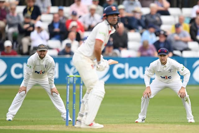 Watching brief: Adam Lyth and Joe Root of Yorkshire watch on as Essex's Sir Alastair Cook compiles his innings. (Photo by Alex Davidson/Getty Images)