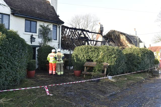 The thatched roof was destroyed in the fire