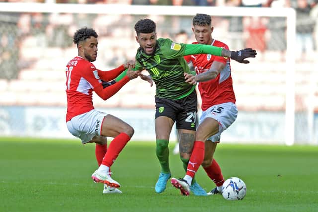Philip Billing is pulled back by Aaron Leya Iseka and Matty Wolfe.
 (
Picture: Bruce Rollinson)