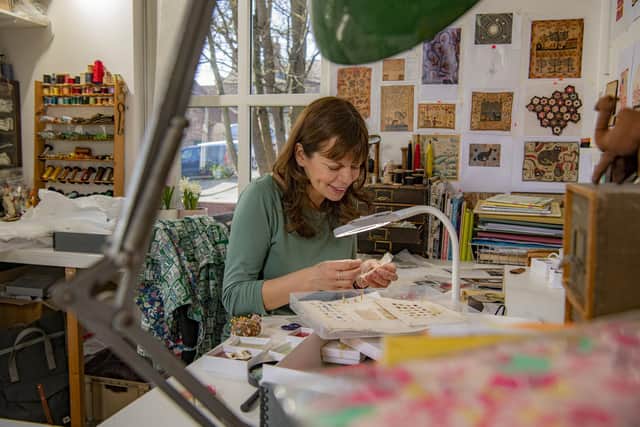 Serena working on one of miniature creations at her studio in Malton
