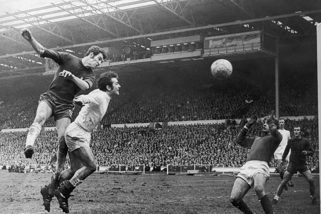 Peter Osgood of Chelsea beats the Leeds United footballer Terry Cooper to the ball during the FA Cup final, while Leeds defender Jack Charlton (second from right) looks on. (Photo by Douglas Miller/Getty Images)