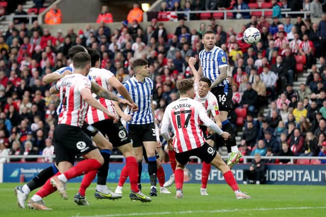 Sheffield Wednesday's Harlee Dean heads at goal. Picture: PA.