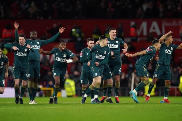 MAGIC MOMENT: Middlesbrough players celebrate winning the penalty shoot-out in the FA Cup fourth round match against Manchester United at Old Trafford Picture: Martin Rickett/PA