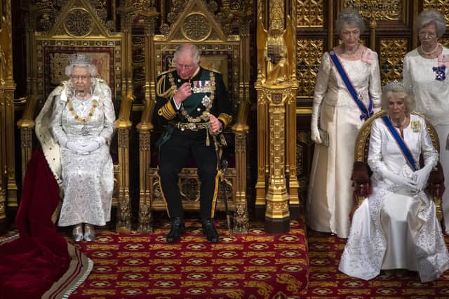 File photo dated 14/10/2019 of Queen Elizabeth II, the Prince of Wales and the Duchess of Cornwall during the State Opening of Parliament in the House of Lords