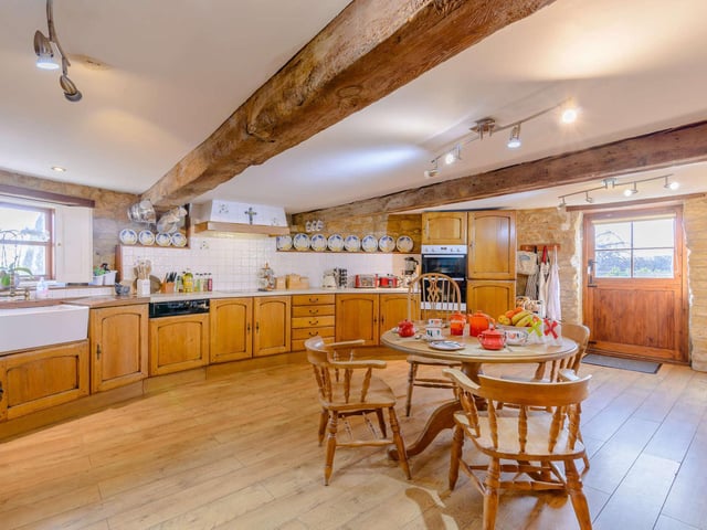 Another view of the large kitchen/diner with extra large door