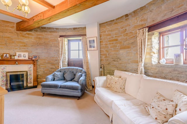 The walls are exposed stone but the home looks and feels cosy