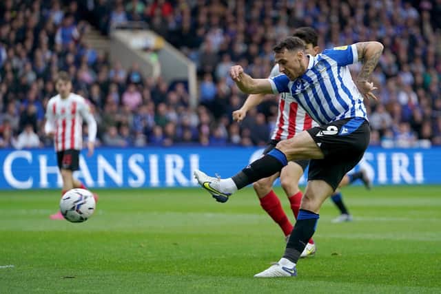 Sheffield Wednesday striker Lee Gregory aims for goal against Sunderland. Picture: PA