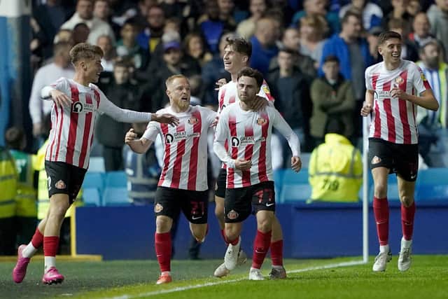 KILLER BLOW: Sunderland's Patrick Roberts (second right) celebrates scoring his side's equaliser at Hillsborough - enough to give the Black Cats the aggregate victory Picture: Zac Goodwin/PA