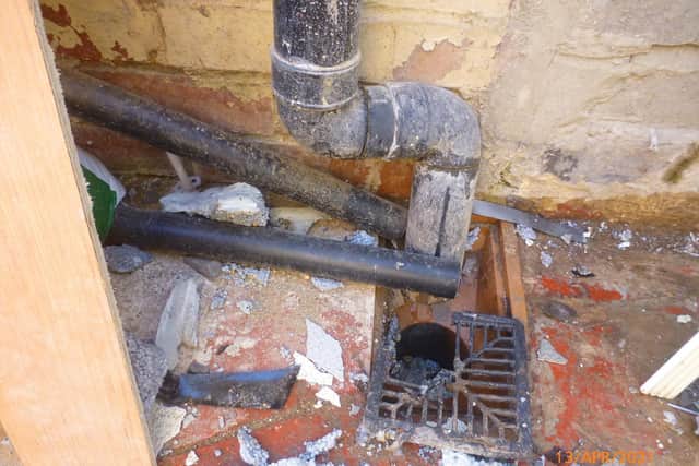 Andrew Padgett, of Guisborough, admitted a string of unfair trading offences at Teesside Magistrates Court last week. Pictured is the shattered drain of one of the homes he worked on.