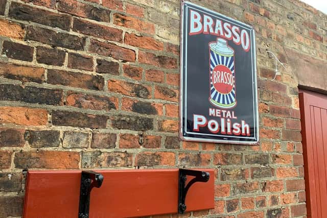 A Brasso polish sign