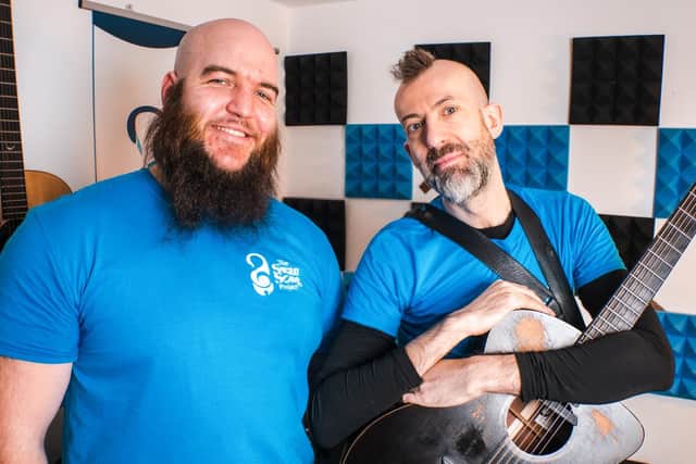 Ben Buddy Slack, founder of The Swan Song Project, with the charity's first ambassador Jon Gomm.