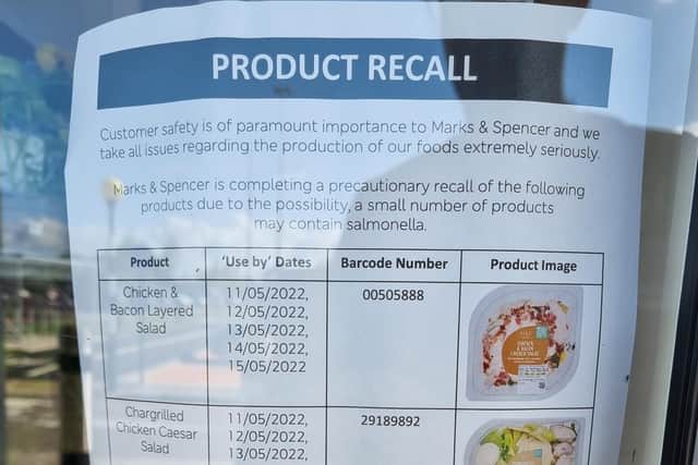 A product recall sign.