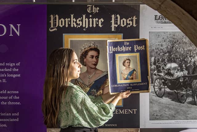 Rosalind Kelly with a copy of the Yorkshire Post Coronation supplement from 1953 on show at York Minster. Image: Tony Johnson.