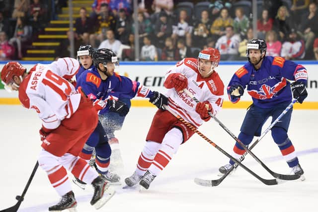 Rob Dowd (left) and Sheffield Steelers and GB team-mate Evan Mosey (far right) battle during last weekend's warm-up loss against Denmark. Picture: Karl Denham/IHUK.