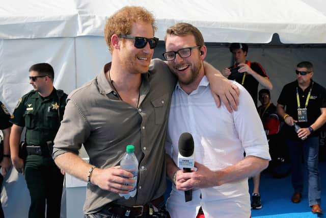 Harry (left) talking to JJ Chalmers during the Invictus Games 2016