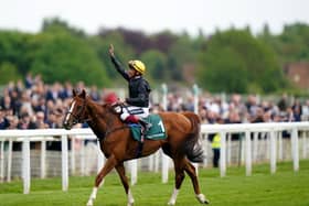 Frankie Dettori waves to spectators after winning the Paddy Power Yorkshire Cup Stakes on Stradivarius during day three of the Dante Festival 2022 at York racecourse. (Picture: PA)