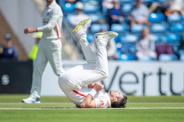 Lancashire's James Anderson attempts to field off his own bowling against Yorkshire. (Picture: Allan McKenzie/SWpix.com)