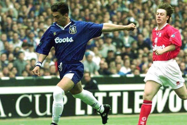 Italy's Roberto Di Matteo pulls back to hit the ball for Chelsea's first goal against Middlesbrough, Saturday May 17, 1997. (AP Photo/Lynne Sladky)