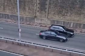 The video shows cars speeding down the closed Bingley bypass (Credit: @LUFC_Malch on Twitter)