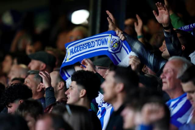 AWAY FOLLOWING: Huddersfield fans will hope to give their side a push in tonight's game after travelling down to support them in Luton. Picture: PA Wire.