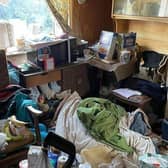 The woman is living in appalling conditions