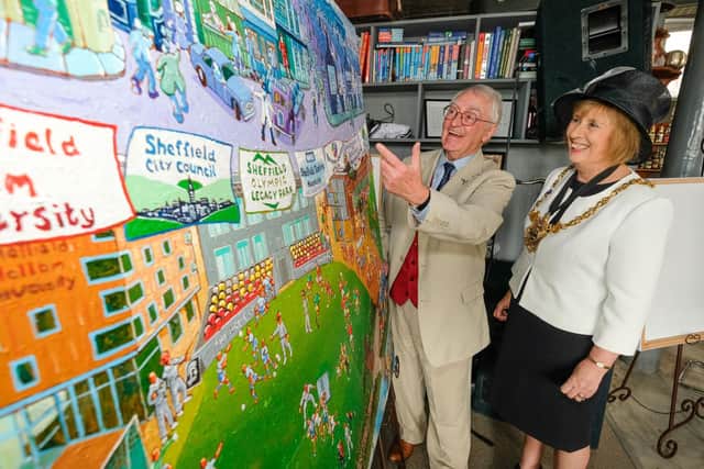 Renowned Sheffield artist Joe Scarborough unveils his latest work, chronicling the regeneration of Attercliffe in the city with Lord Mayor Coun Gail Smith.