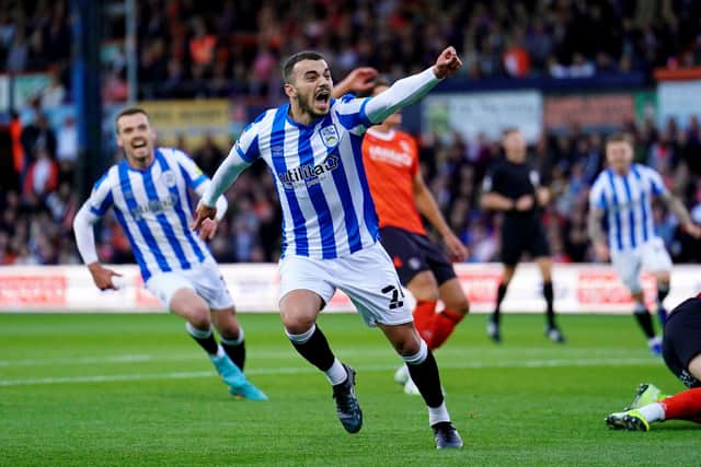 Huddersfield Town's Danel Sinani celebrates scoring his side's goal against Luton Town at Kenilworth Road on Friday night. Picture: Adam Davy/PA