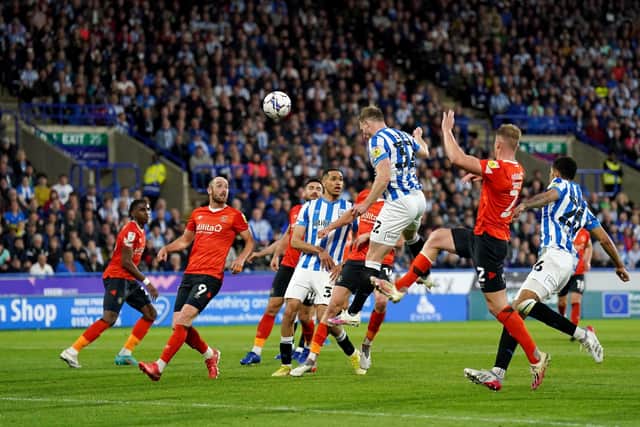 Huddersfield Town's Tom Lees has an attempt on goal. Picture: PA