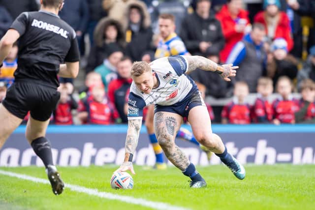 Josh Charnley goes over to score against Leeds Rhinos in round one. (Picture: SWPix.com)