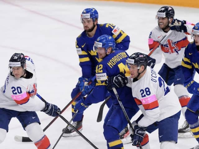 GB captain Jon Phillips, above left, said his team let themselves down with a poor first period against powerhouse Sweden. Picture: Dean Woolley/IHUK.