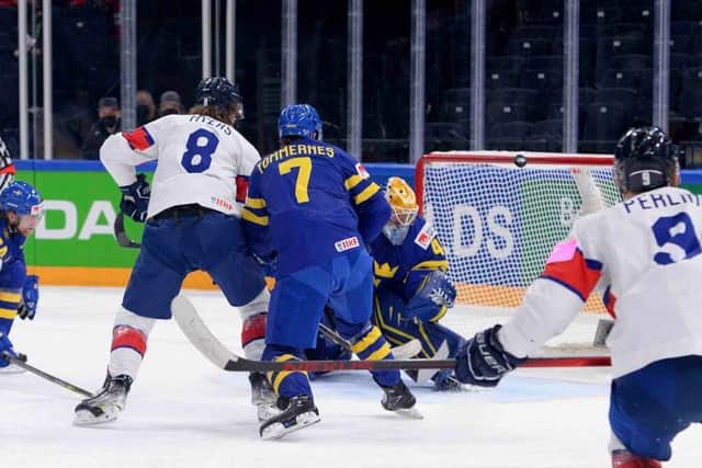 SO CLOSE: Matthew Myers (No 8) hits the post against Sweden during the second period. Picture: Dean Woolley/IHUK.